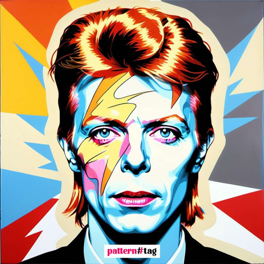 Pannello in tessuto dedicato a David Bowie, con una rappresentazione dell'icona musicale che ha rivoluzionato il mondo del rock e della cultura pop. Un elemento decorativo che aggiunge creatività, stile e un tocco di eccentricità al tuo spazio, celebrando l'arte e l'innovazione di Bowie.